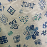 Patches on Blue Poly Cotton Fabric