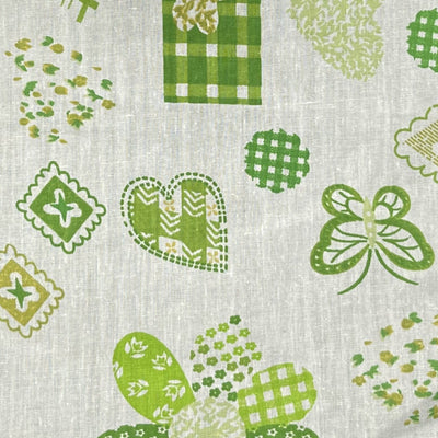 Patches on Green Poly Cotton Fabric