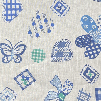 Patches on Blue Poly Cotton Fabric