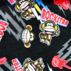 Rockstar Monkey on Black Anti Pill Animal Theme Fleece Fabric
