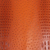 Orange Mutant Ostrich Gator Embossed Vinyl Fabric