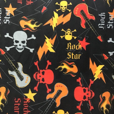 Rock star Guitar Skulls on Black Anti Pill Fleece Fabric