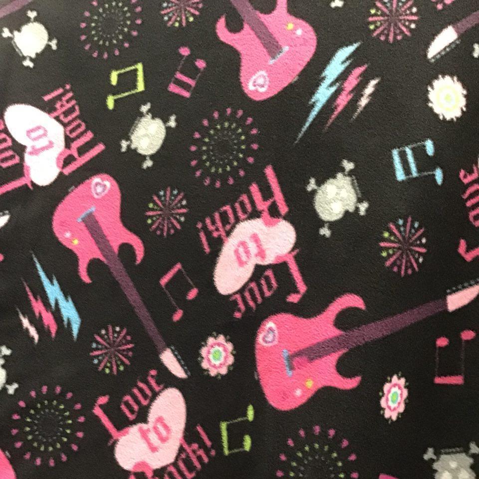 Pink Guitar on Black Anti Pill Fleece Fabric