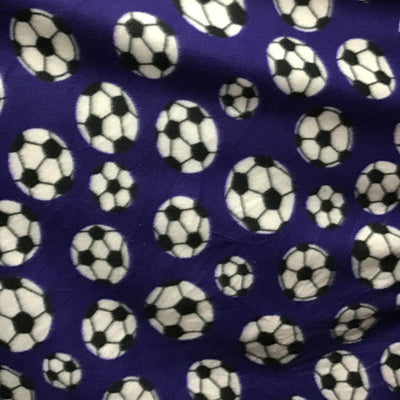 Soccer Balls on Purple Fleece Fabric